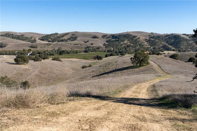 an aerial view of ocean beach and residential houses