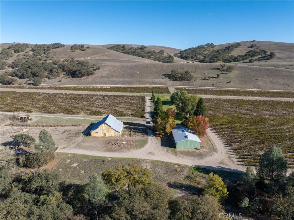 77620 Lowes Canyon Road San Miguel, CA 93451 - Photo 32 of 56 a view of a lake with a mountain in the background