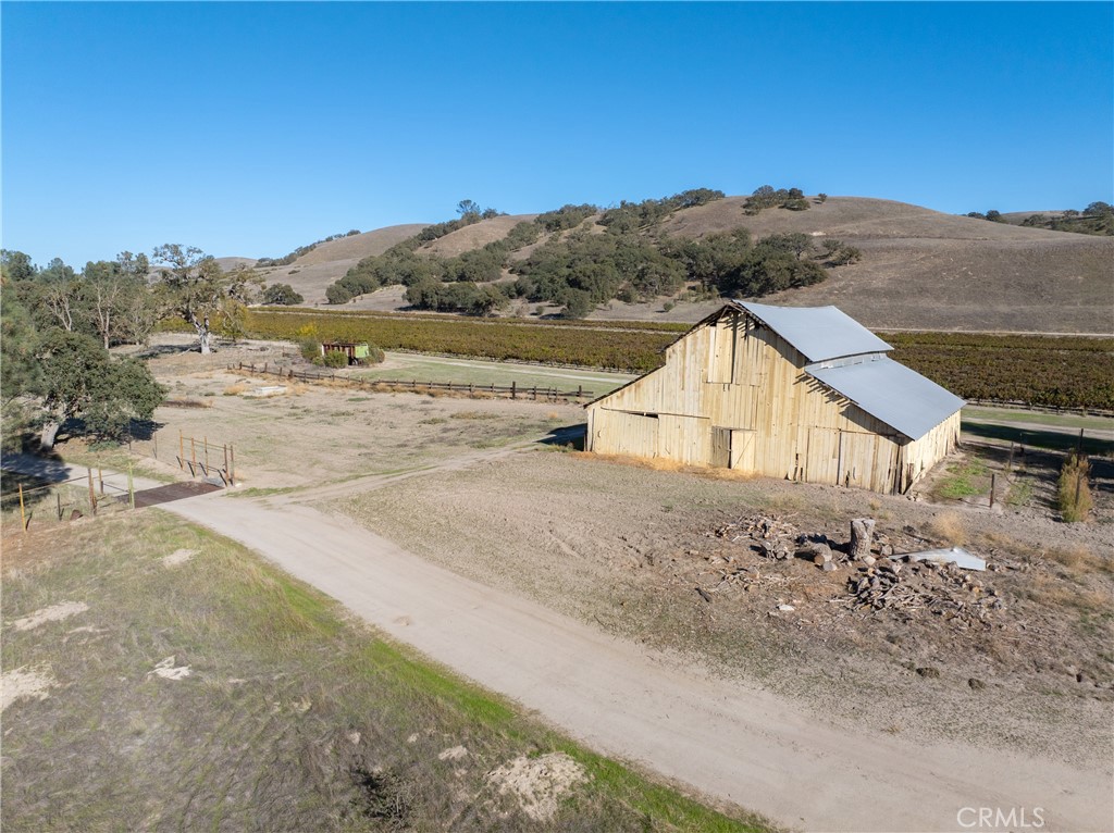 77620 Lowes Canyon Road San Miguel, CA 93451 - Photo 34 of 66 an outdoor view of house with ocean view