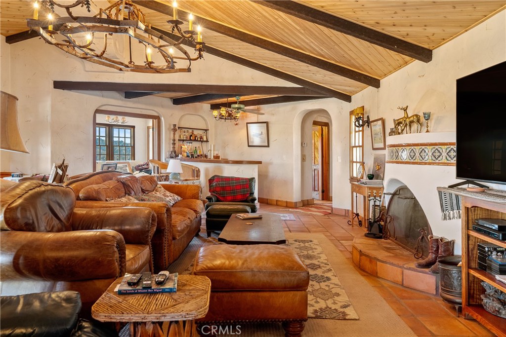 77620 Lowes Canyon Road San Miguel, CA 93451 - Photo 40 of 56 a living room with furniture and a flat screen tv