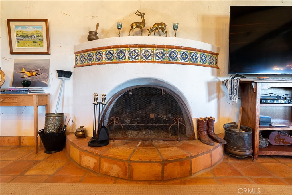 77620 Lowes Canyon Road San Miguel, CA 93451 - Photo 56 of 56 a view of a water heater room with a fireplace
