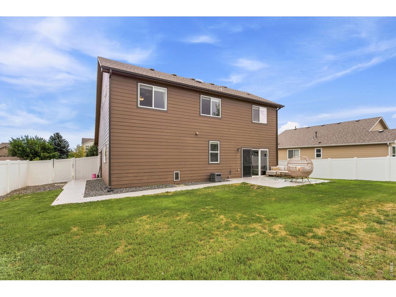 6837 McClellan Road Wellington, CO 80549 - Photo 21 of 23 Enjoy a fully fenced backyard with room to play, entertain, garden, or simply relax.