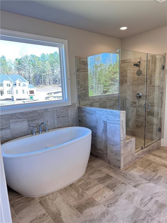 2175 Calverton Lane Southwest Atlanta, GA 30331 - Photo 3 of 11 a bath tub sitting in a bathroom next to a window