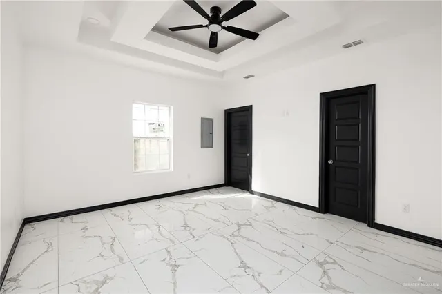 a view of an empty room and window