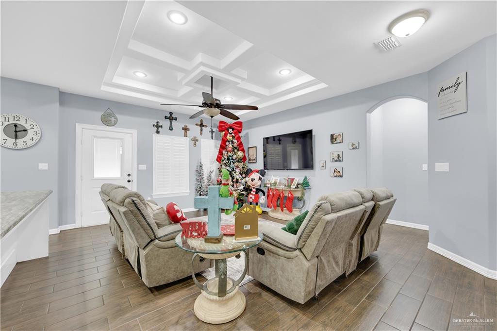 107 Nazareth Street Rio Grande City, TX 78582 - Photo 11 of 26 a living room with furniture and a flat screen tv