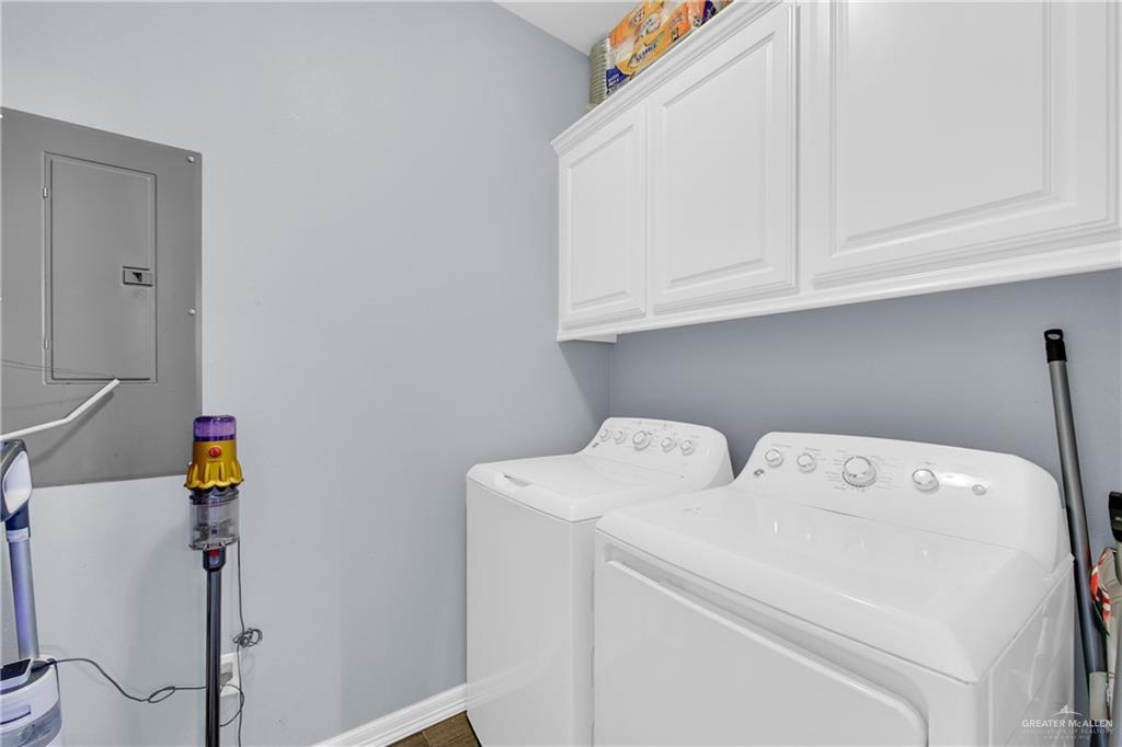 107 Nazareth Street Rio Grande City, TX 78582 - Photo 20 of 26 a utility room with dryer and washer