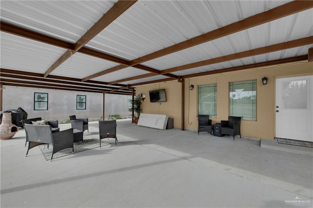 107 Nazareth Street Rio Grande City, TX 78582 - Photo 22 of 26 a living room with furniture and a large window