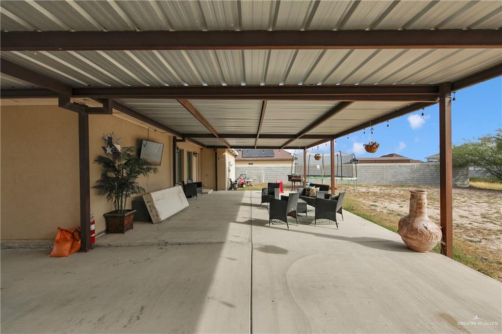 107 Nazareth Street Rio Grande City, TX 78582 - Photo 23 of 26 a view of a patio with table and chairs