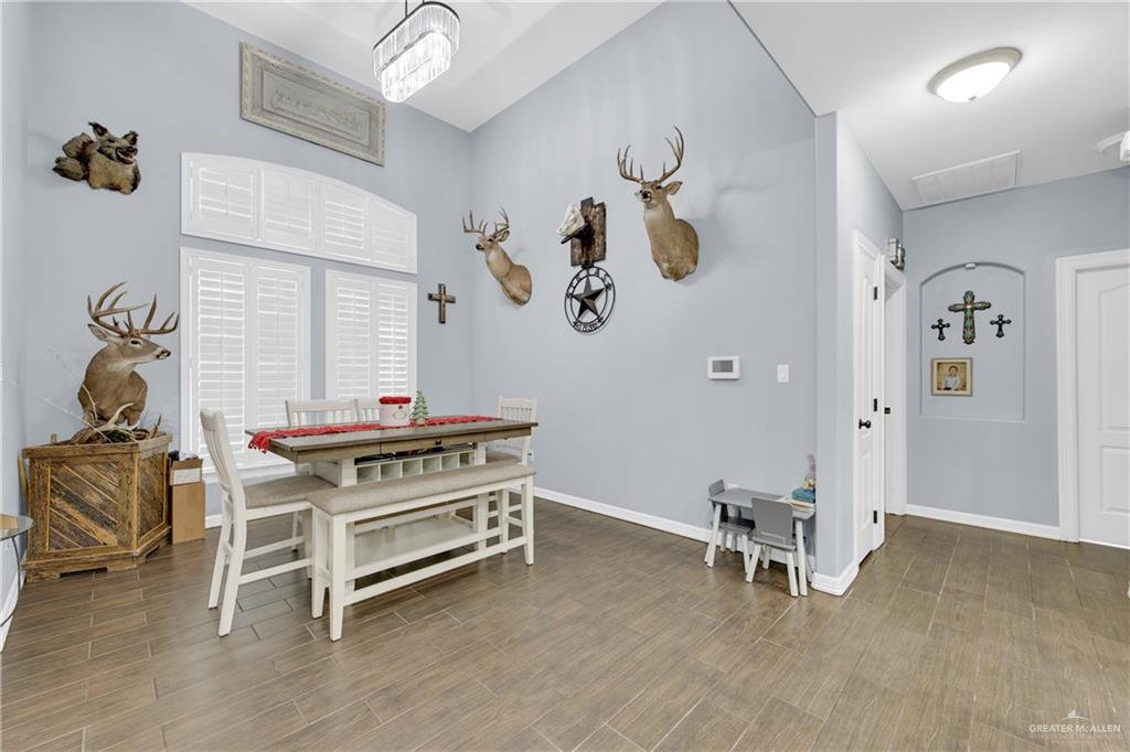 107 Nazareth Street Rio Grande City, TX 78582 - Photo 7 of 26 a bed room with a bed and a chair