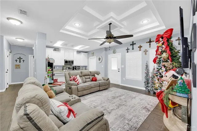 a kitchen with stainless steel appliances white cabinets and sink
