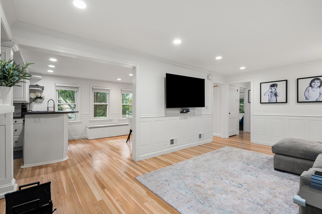 145 Pond Brook Road Newton, MA 02467 - Photo 13 of 39 a living room with furniture and a flat screen tv