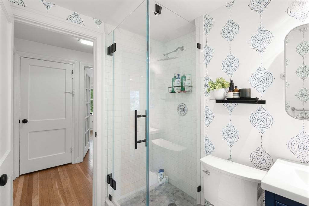 145 Pond Brook Road Newton, MA 02467 - Photo 17 of 39 a bathroom with a sink and toilet