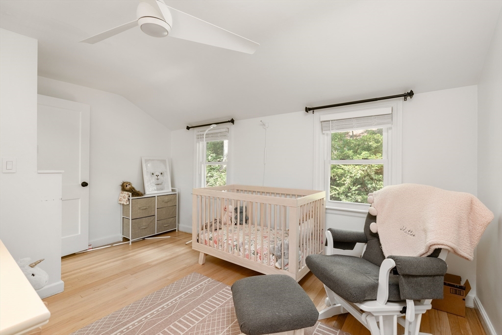145 Pond Brook Road Newton, MA 02467 - Photo 28 of 39 a bedroom with furniture and a window