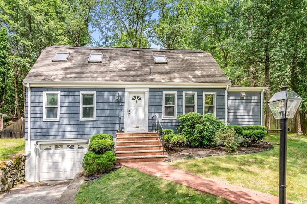 145 Pond Brook Road Newton, MA 02467 - Photo 3 of 39 a view of house that has a small yard