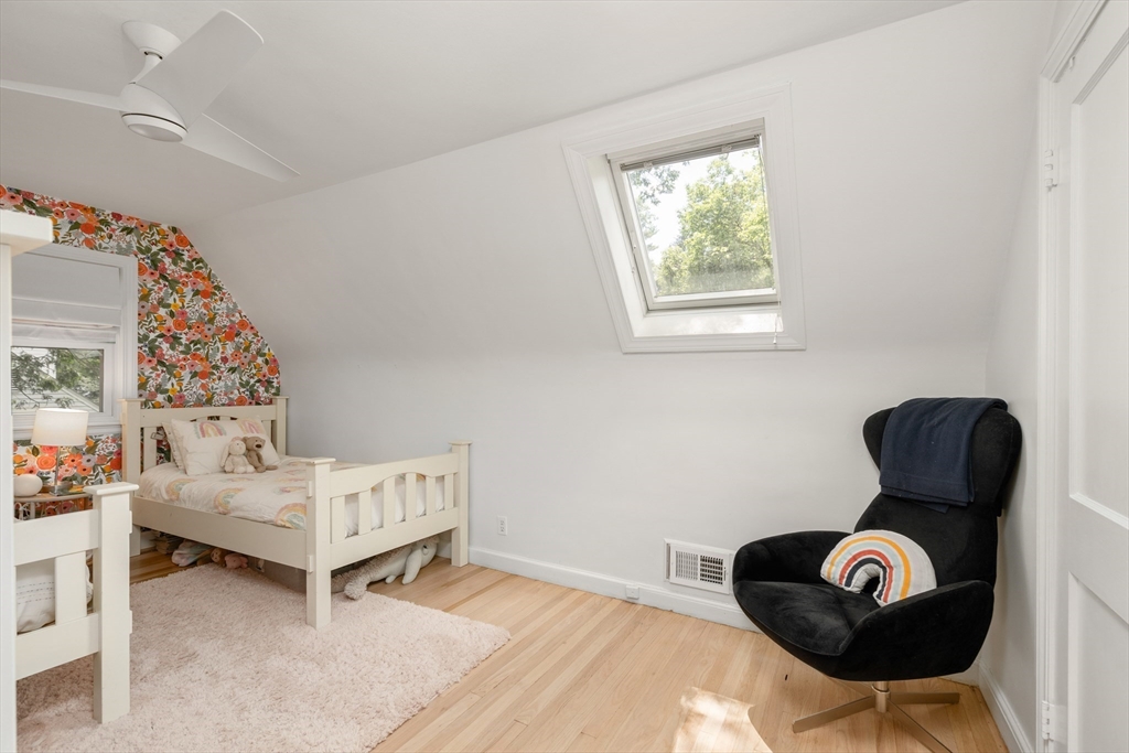 145 Pond Brook Road Newton, MA 02467 - Photo 31 of 39 a living room with furniture and a window