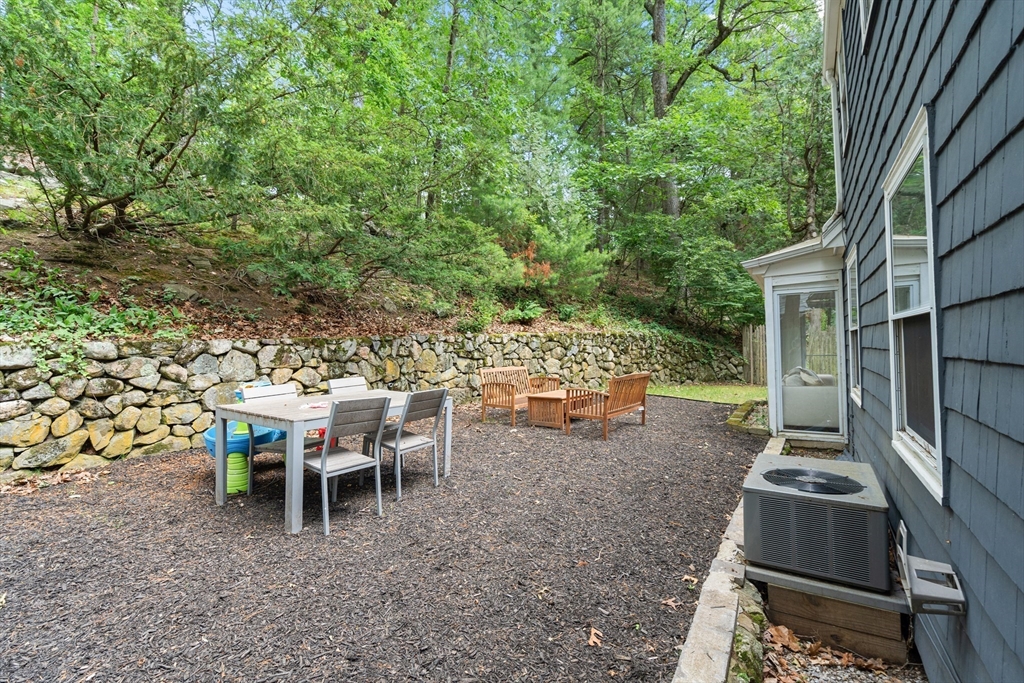 145 Pond Brook Road Newton, MA 02467 - Photo 38 of 39 a view of a backyard with sitting area