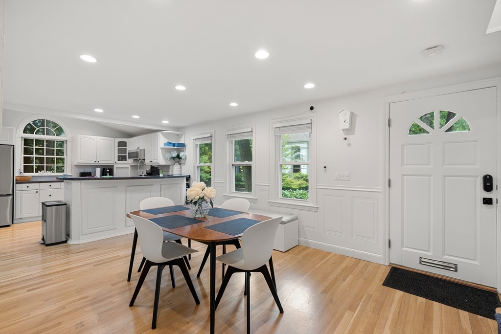 145 Pond Brook Road Newton, MA 02467 - Photo 4 of 39 a kitchen with a table and chairs in it