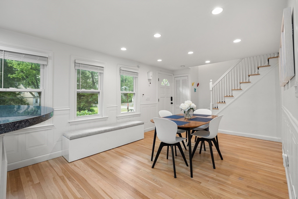 145 Pond Brook Road Newton, MA 02467 - Photo 6 of 39 a view of a dining room with furniture and wooden floor
