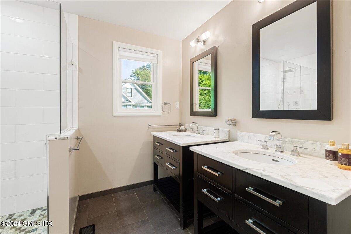 70 Gregory Road Cos Cob, CT 06807 - Photo 16 of 39 a view of bathroom with dual sinks