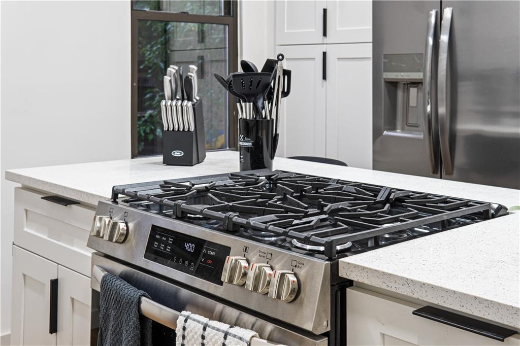 523 Alpine Avenue Pittsburgh, PA 15212 - Photo 14 of 29 a close view of a stove top oven sitting inside of a kitchen
