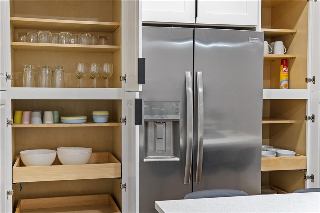 523 Alpine Avenue Pittsburgh, PA 15212 - Photo 19 of 29 a kitchen with a refrigerator and cabinets