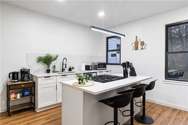 a bedroom with a bed and a desk
