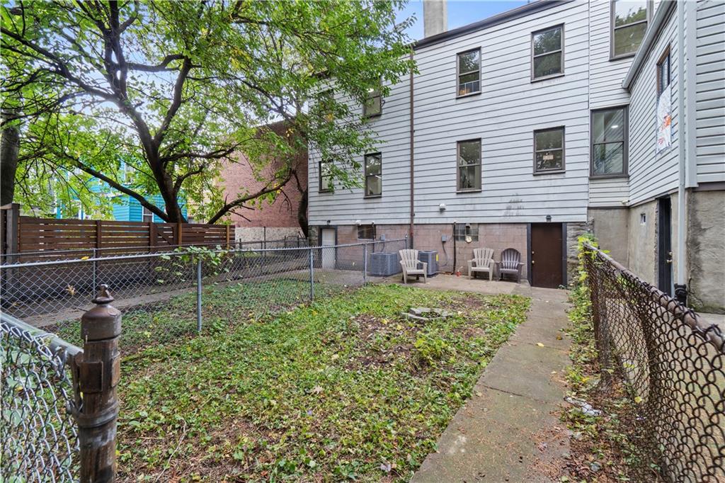 523 Alpine Avenue Pittsburgh, PA 15212 - Photo 28 of 29 a front view of a house with garden