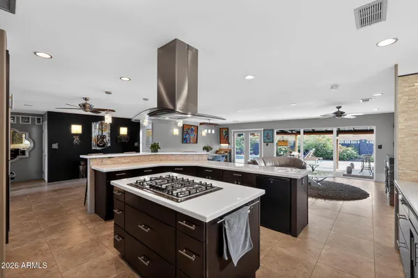 a kitchen with a stove and a sink