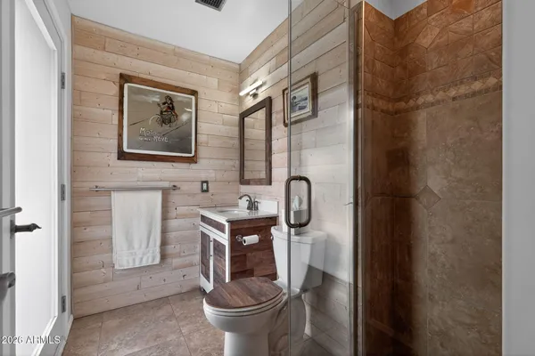 a bathroom with a toilet and a sink