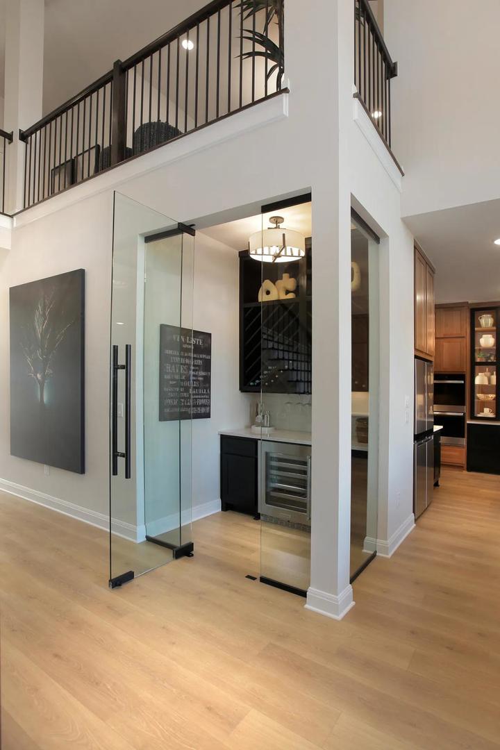 2033 Morning Mist Drive Georgetown, TX 78628 - Photo 19 of 36 a view of a livingroom with an entryway and a fireplace