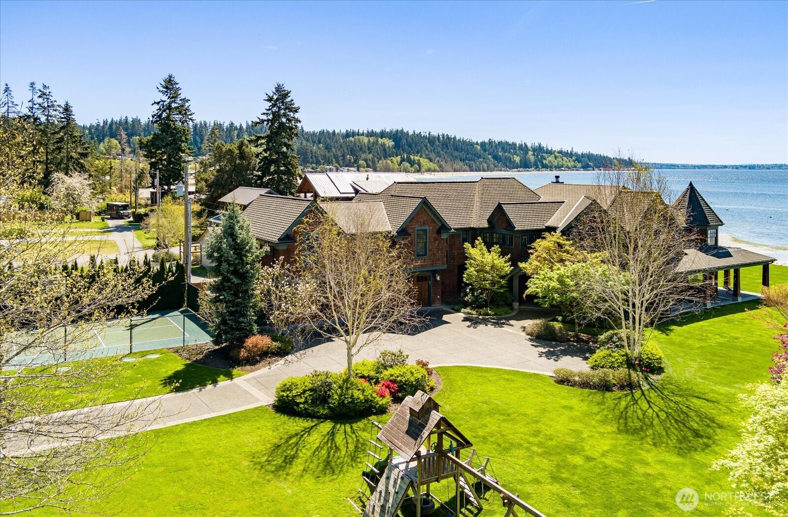 5848 Mutiny Bay Road Freeland, WA 98249 - Photo 13 of 40 a view of a lake with a yard