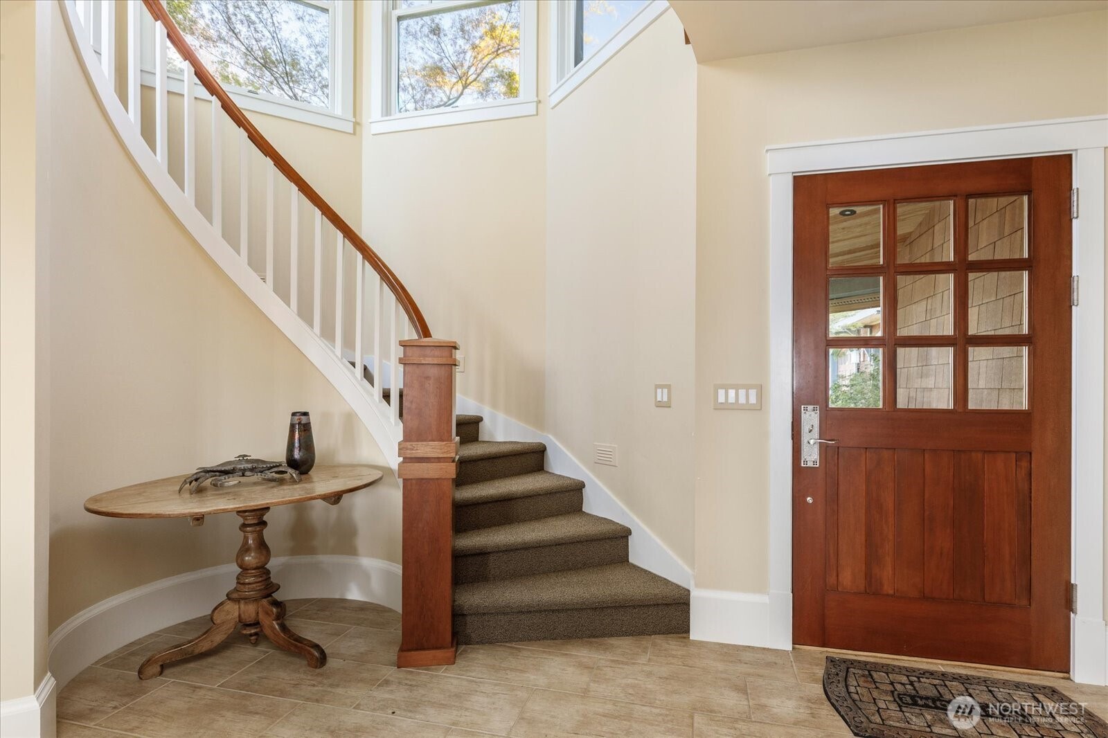 5848 Mutiny Bay Road Freeland, WA 98249 - Photo 17 of 40 a view of entryway with wooden floor and stairs