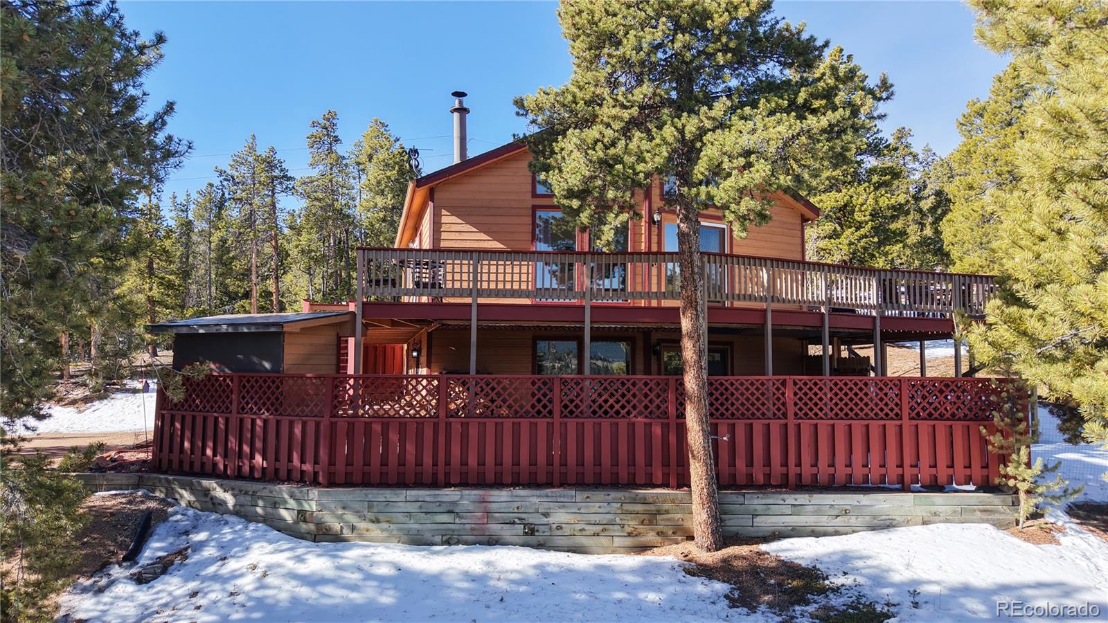 225 Rd P62 Bailey, CO 80421 - Photo 26 of 49 front view of a house with a balcony