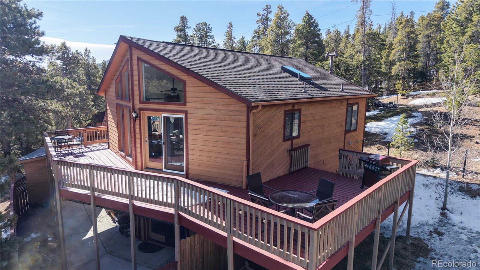 225 Rd P62 Bailey, CO 80421 - Photo 28 of 49 a view of house with a deck and furniture