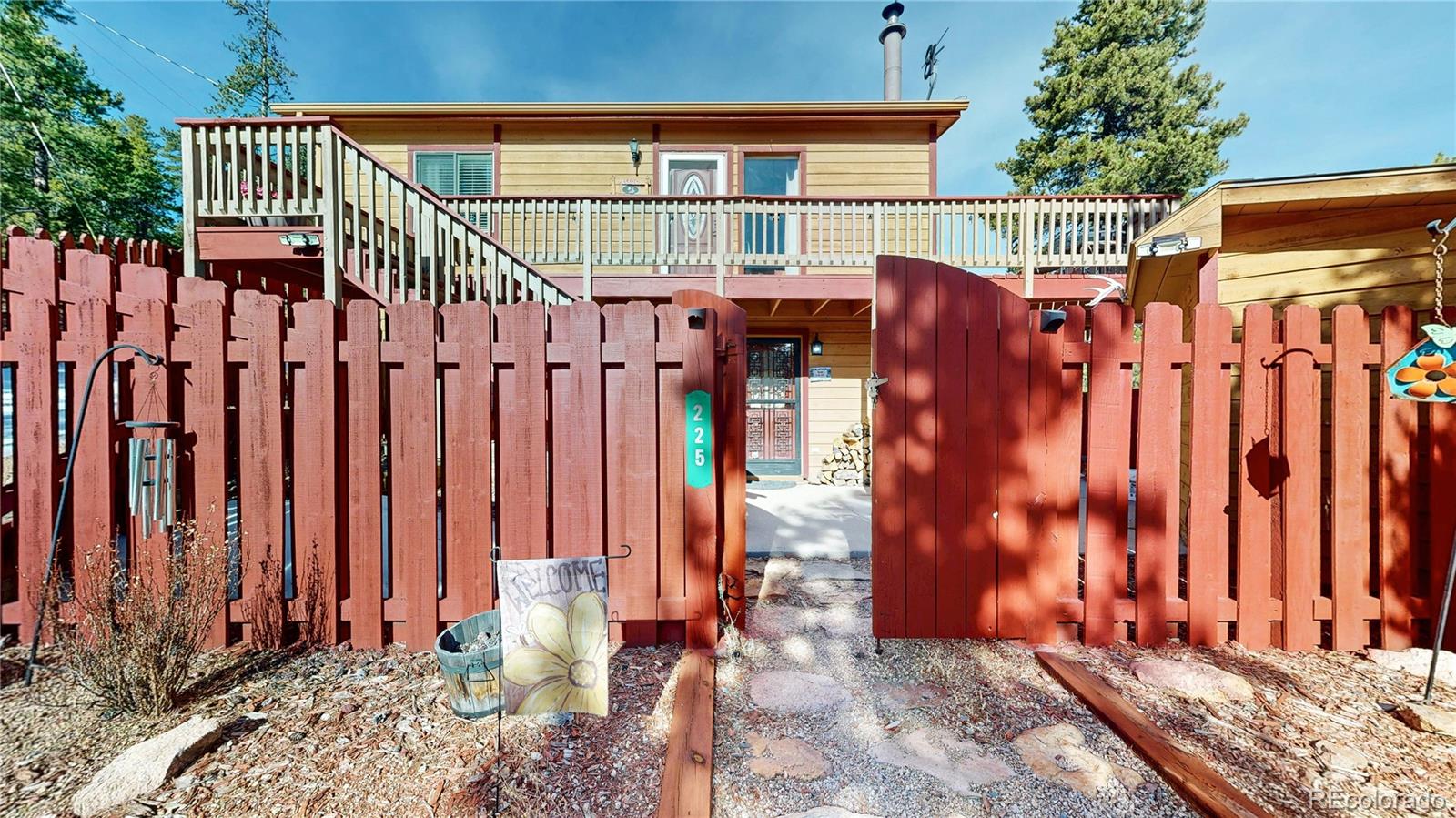 225 Rd P62 Bailey, CO 80421 - Photo 37 of 49 a view of a wooden fence with a pot