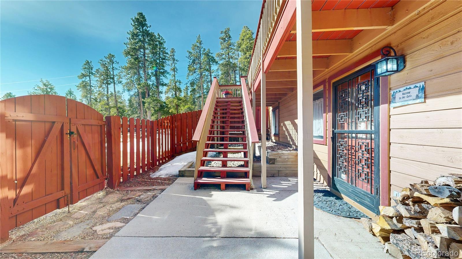 225 Rd P62 Bailey, CO 80421 - Photo 40 of 49 a view of balcony with wooden floor and fence