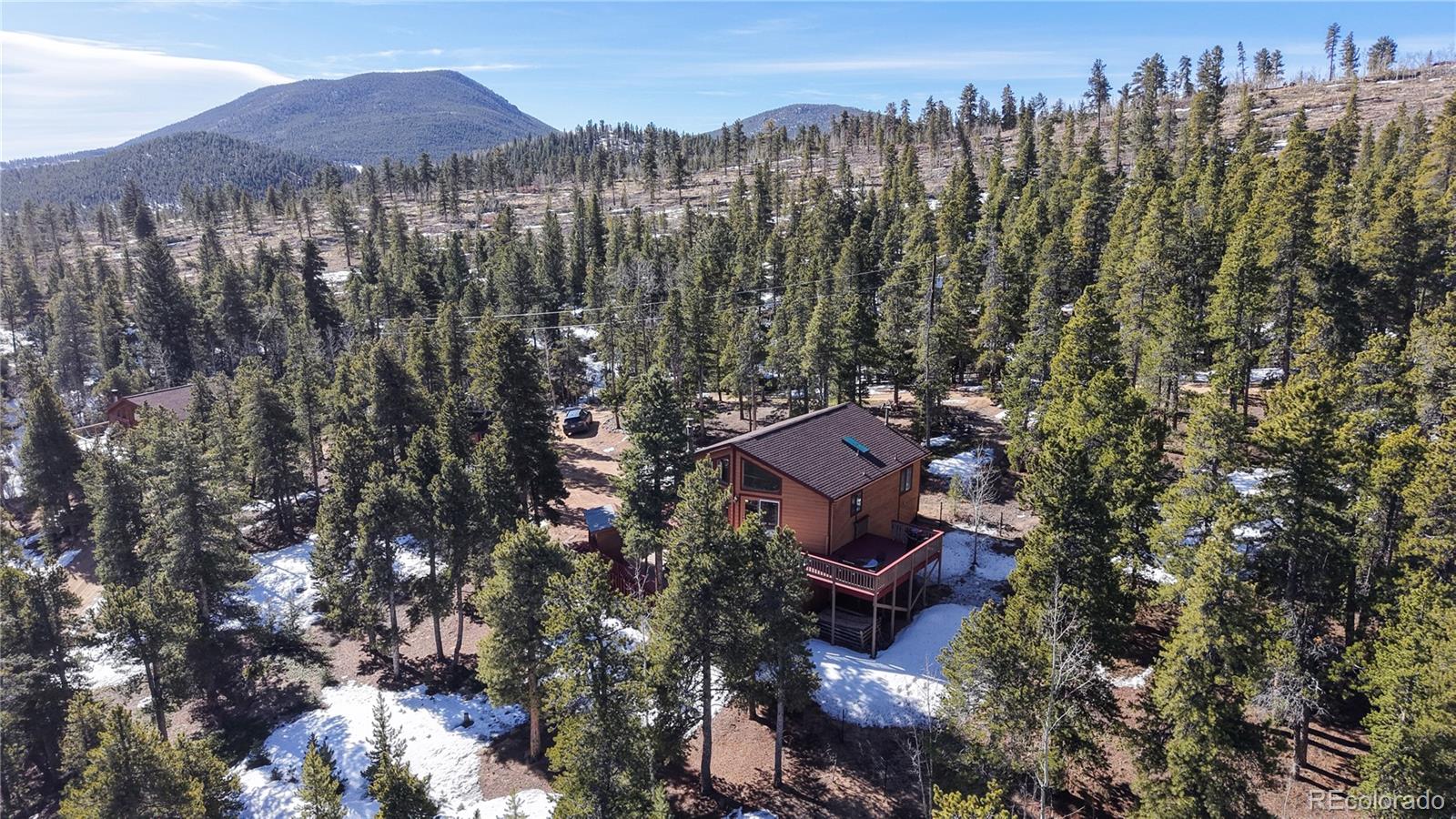 225 Rd P62 Bailey, CO 80421 - Photo 47 of 49 a view of a house with a mountain and a forest