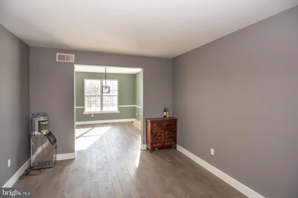 a view of a workspace with furniture