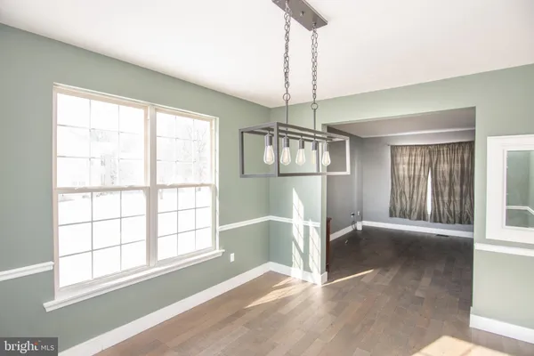 a bedroom with a bed and furniture