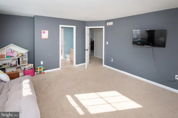 a view of a swimming pool with a yard