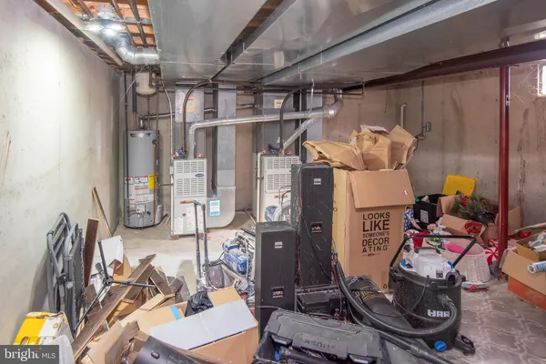 a view of a yard with a house in the background