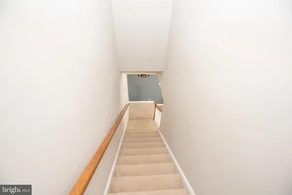a kitchen with a sink stove and microwave