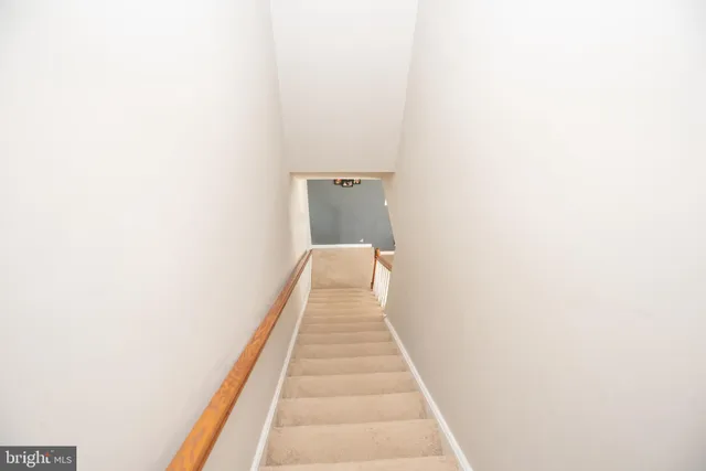 a kitchen with a sink stove and microwave