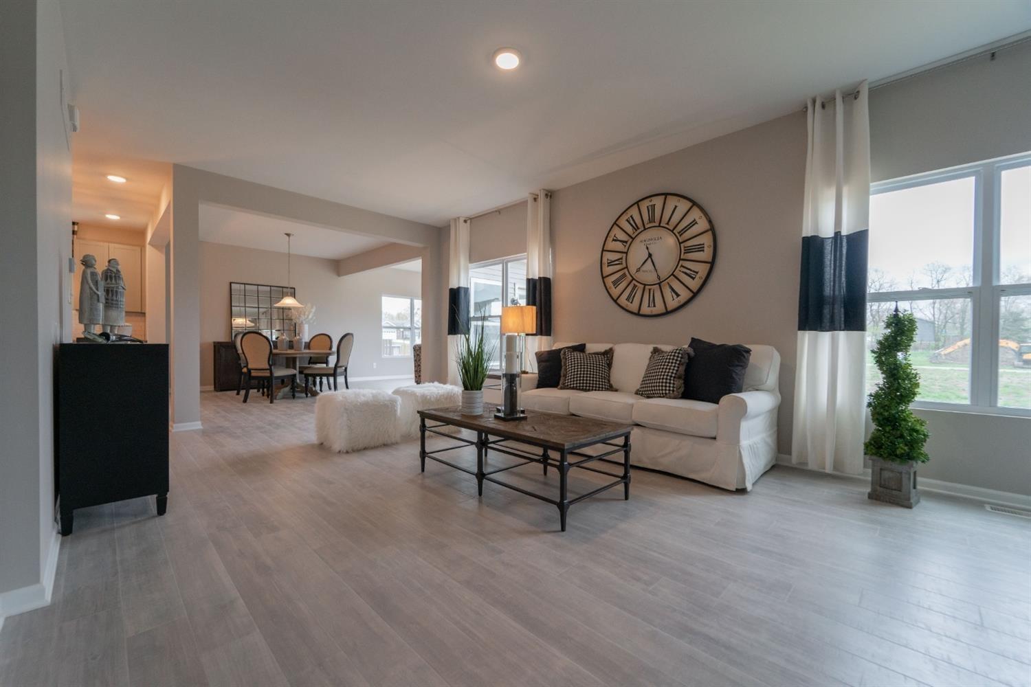 8665 Burr Rdg Circle Crown Point, IN 46307 - Photo 6 of 21 a living room with furniture and a table