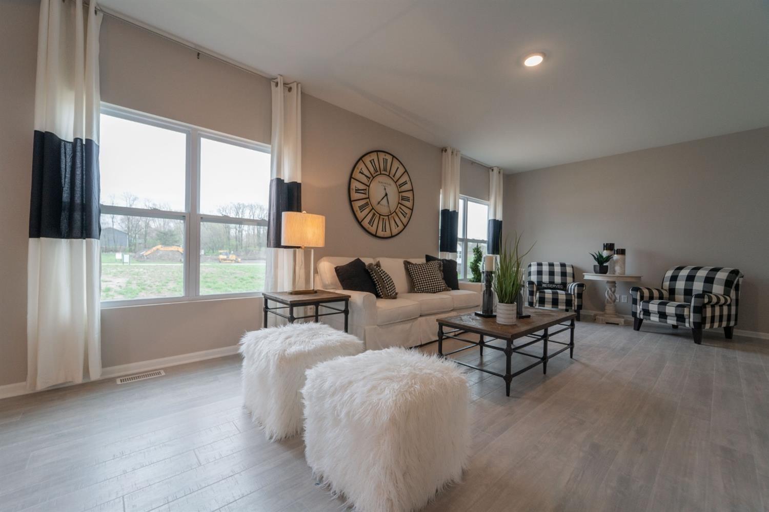 8665 Burr Rdg Circle Crown Point, IN 46307 - Photo 7 of 21 a living room with furniture and a large window