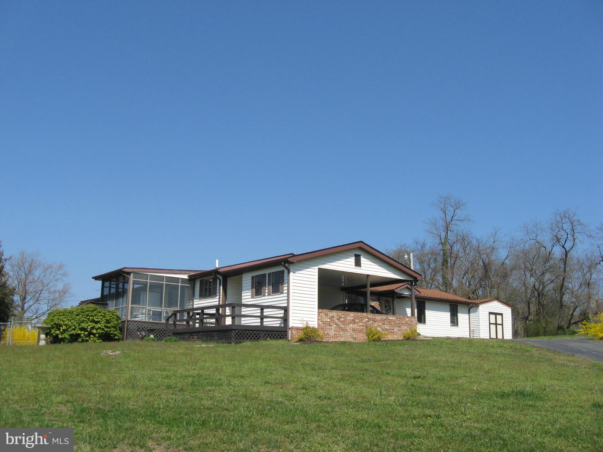 19699 North Snow Hill Manor Road Lexington Park, MD 20653 - Photo 3 of 29 Exterior - L-shaped Rambler w/car port