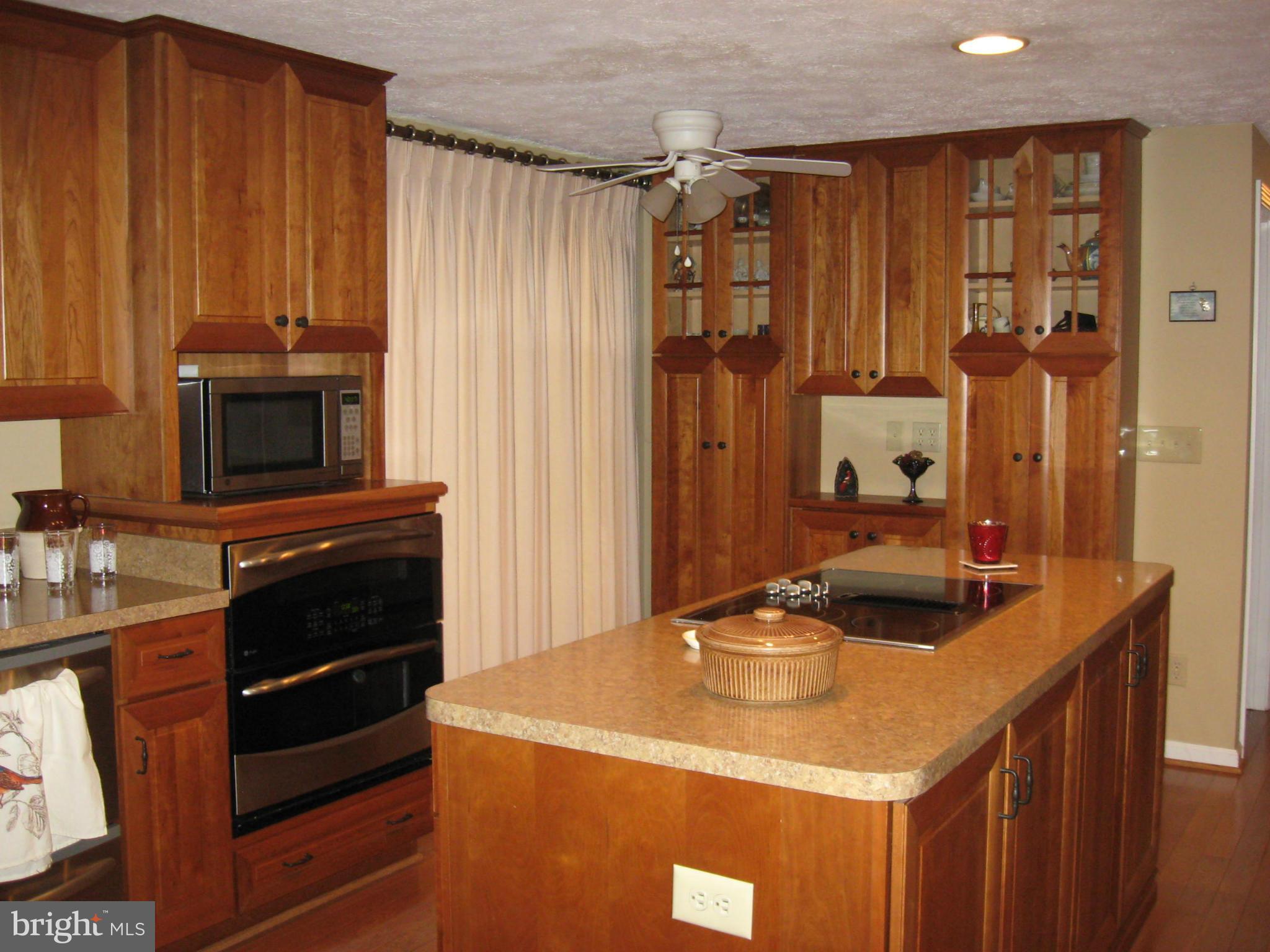 19699 North Snow Hill Manor Road Lexington Park, MD 20653 - Photo 7 of 29 Kitchen w/slider to screened porch