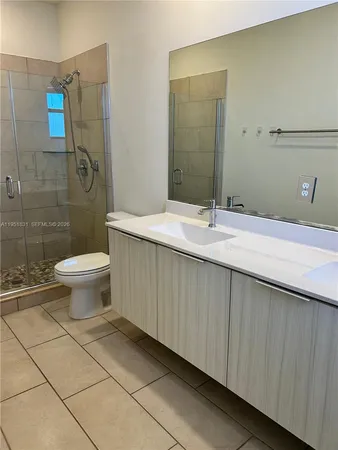 a bathroom with a sink a toilet and a bathtub