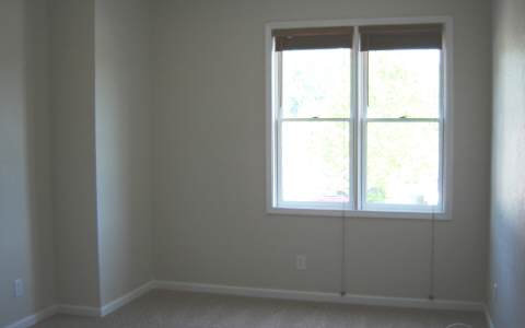 500 East Main Street, Unit 308 Blue Ridge, GA 30513 - Photo 2 of 12 a view of an empty room with a window