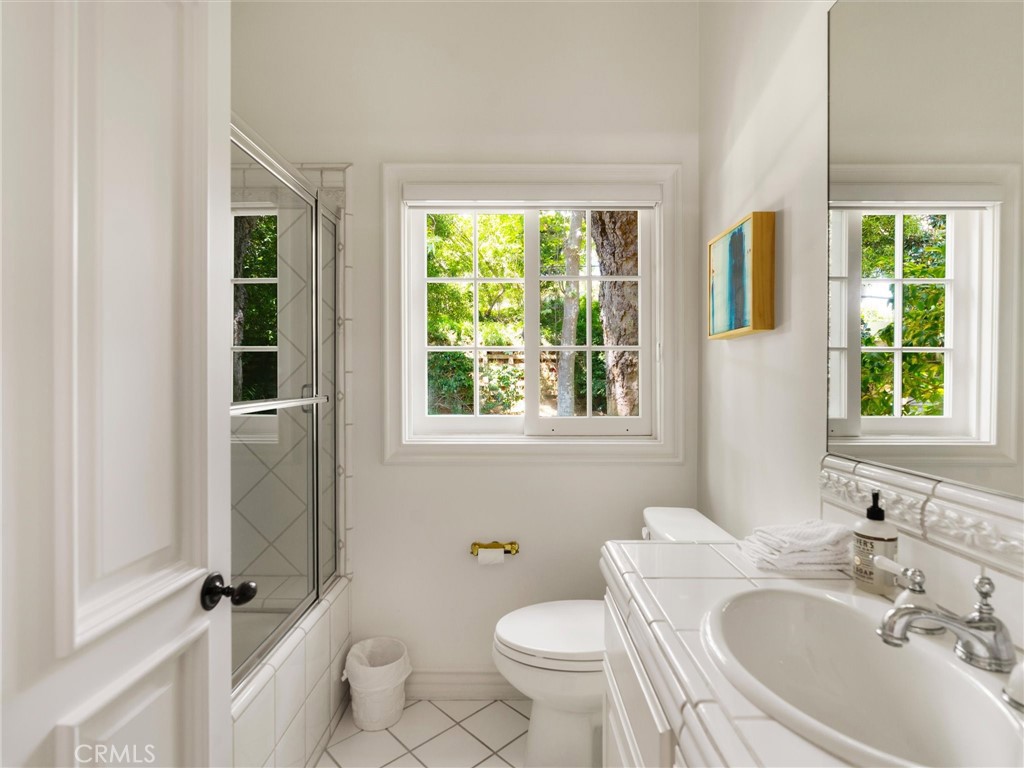 6000 Cavalleri Road Malibu, CA 90265 - Photo 25 of 44 a bathroom with a sink and a window